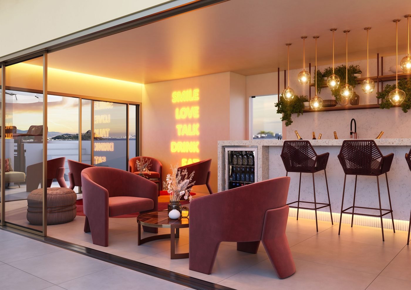 Perspectiva do lounge do rooftop do Sou+ Charitas ao entardecer